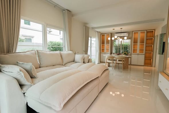 living room and bedroom of Villaggio 3 Srinakarin-Bangna