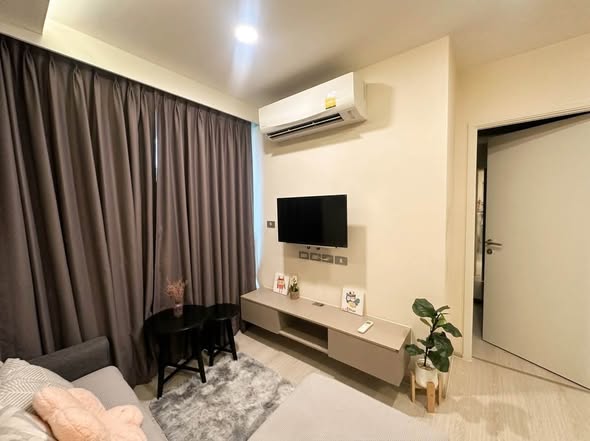 bedroom and living room of VTARA36 Condominium