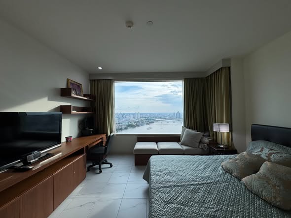 living room and bedroom of Watermark Chao Phraya