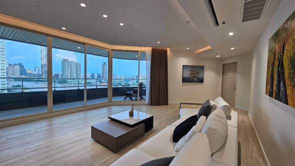 living room and bedroom of Watermark Chao Phraya