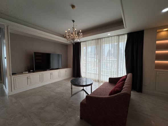 living room and bedroom of Wilshire Condominium